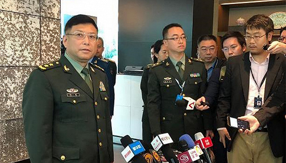 中国军方:南海驻军和部署武器是中国内政,不容