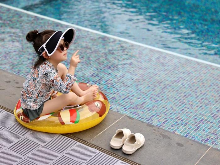 A picture containing little, water sport, swimmingDescription automatically generated