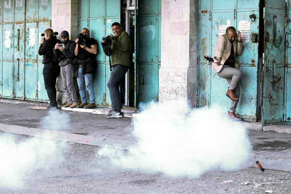 图集】至少31名记者在巴以冲突中遇难：聚焦记录硝烟历史的战地记者 